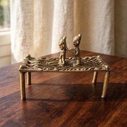 Handcrafted Dhokra Brass Figurine – Tribal Couple Sitting on Traditional Woven Cot (Charpai)